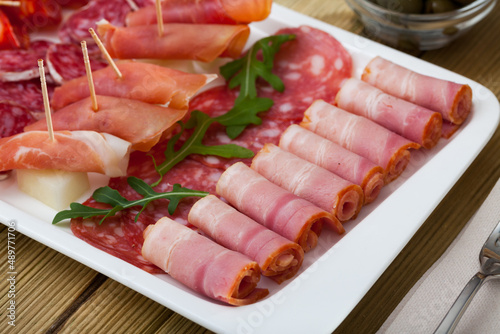Chorizo, fuet, jamon salami, bacon spanish meat antipasto platter