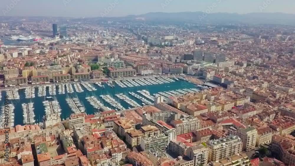 The beautiful and lively Old Port of Marseille, a yacht Marina in Southern France. Wide angle aerial