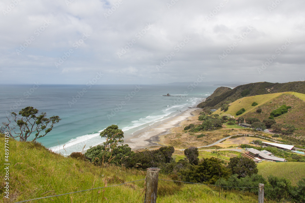 Aerial view on Mangawhai Heads Beach in a cloudy day, New Zealand.
