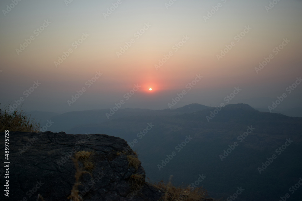 sunset over the mountains from Submarine point, Lonawala