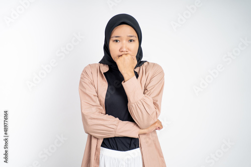 worried muslim asian woman gesture on isolated background