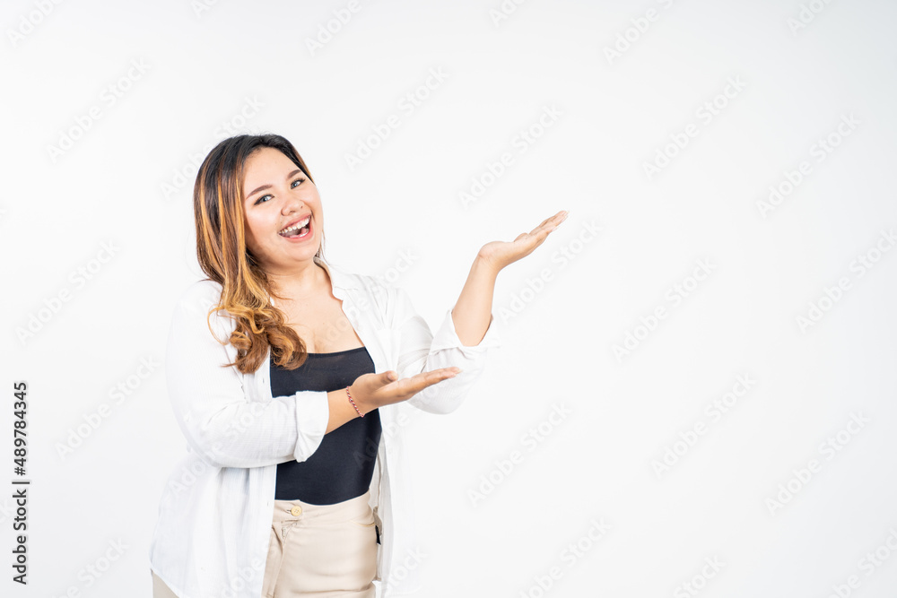 beautiful asian woman with hand gesture presenting beautiful asian woman with hand gesture presenting