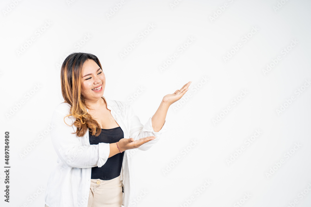 beautiful asian woman with hand gesture presenting beautiful asian woman with hand gesture presenting