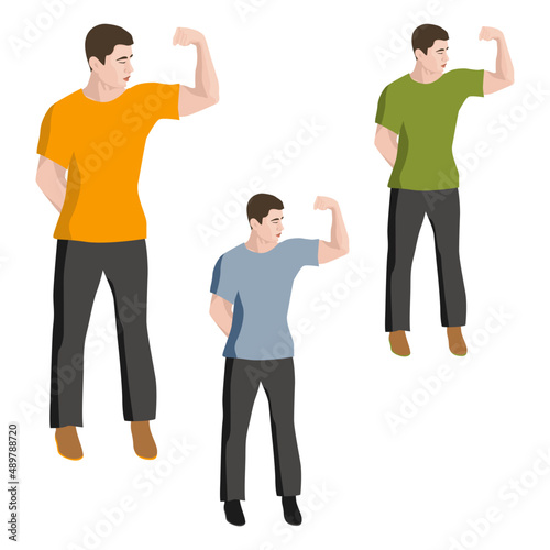 A young man shows his biceps looks at the muscles