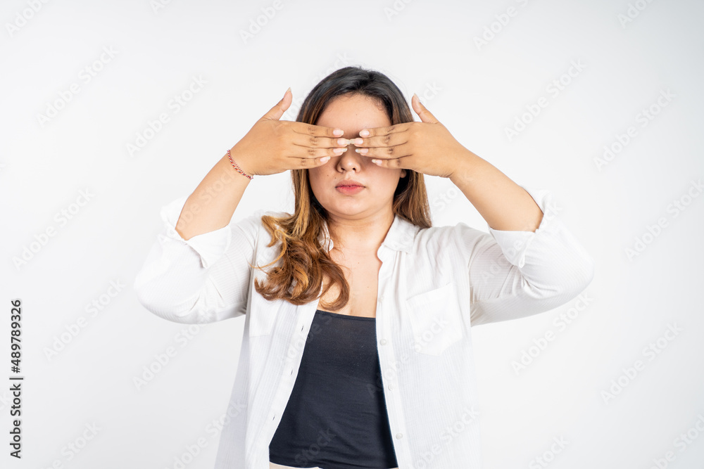asian woman shut her eyes with hand asian woman shut her eyes with hand