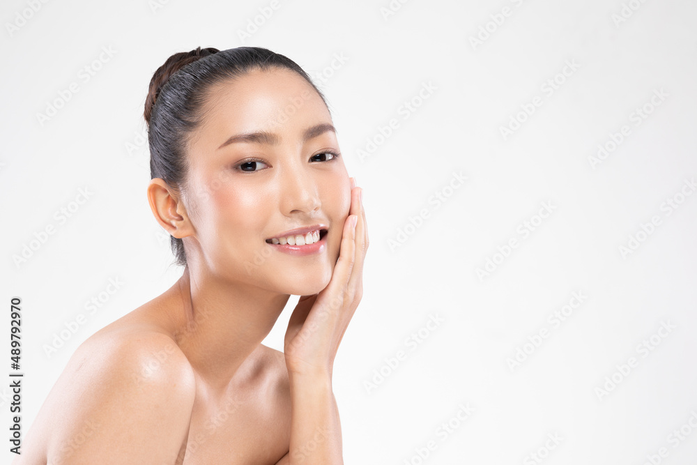 Beautiful Asian young woman touching soft cheek smile with clean and fresh skin Happiness and cheerful with positive emotional,isolated on white background,Beauty and Cosmetics Concept Beautiful Asian young woman touching soft cheek smile with clean and fresh skin Happiness and cheerful with positive emotional,isolated on white background,Beauty and Cosmetics Concept