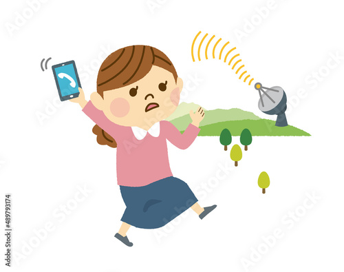 電波の良い場所を探す女性