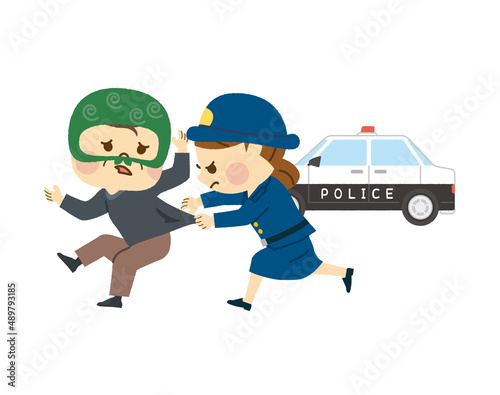 泥棒を捕まえる警察官