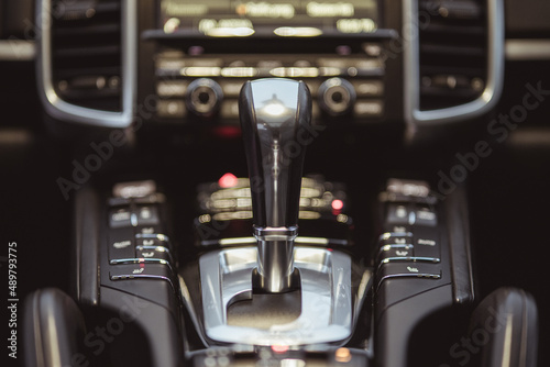 Shifter for automatic transmission of a modern sportscar or suv. View from the rear seat.