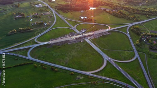 European Route E 67, Aerial View Of Cars Driving At Baltic Way At Dusk Near Panevezys In Lithuania. photo