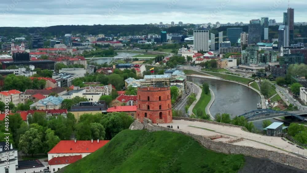 Gediminas Castle Tower, Neris River, And Vilnius Business District In Lithuania. - aerial orbit Gediminas Castle Tower, Neris River, And Vilnius Business District In Lithuania. - aerial orbit