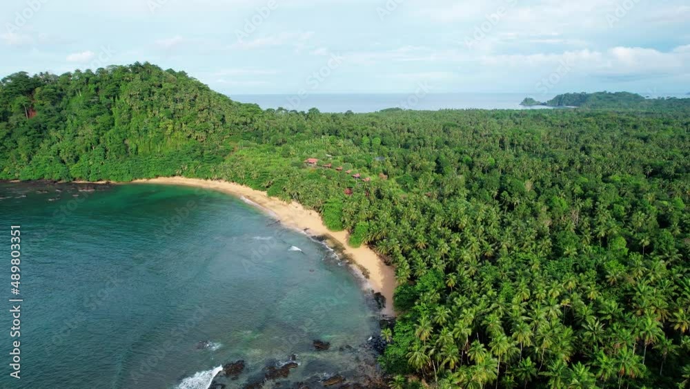 Aerial drone view towards cabins at the Inhame beach, in sunny Sao Tome, Africa Aerial drone view towards cabins at the Inhame beach, in sunny Sao Tome, Africa