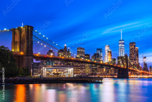 new york,usa. 08-27-17 : brooklyn bridge with new york skyline background at night. © checubus