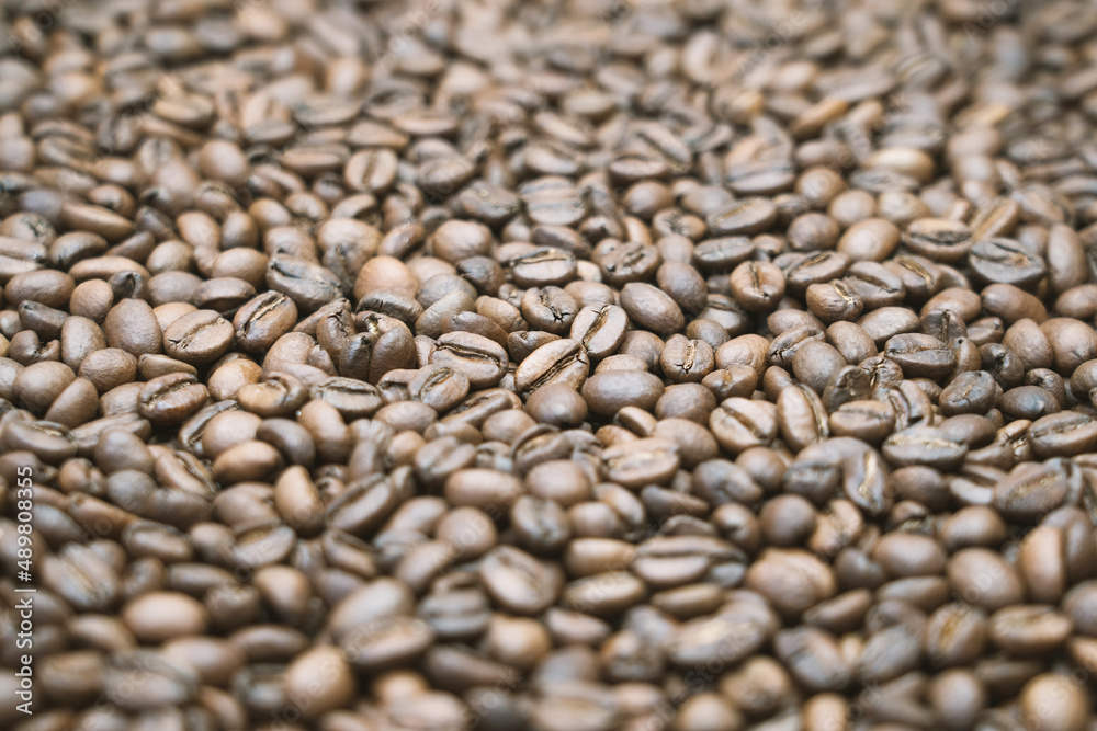 Coffee for the screensaver. Roasted coffee beans as texture concept Coffee for the screensaver. Roasted coffee beans as texture concept