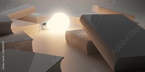 Glowing light bulb laying between scattered white books over white background  education  intelligence or idea concept