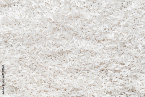Long-grain white rice. Background, texture.
