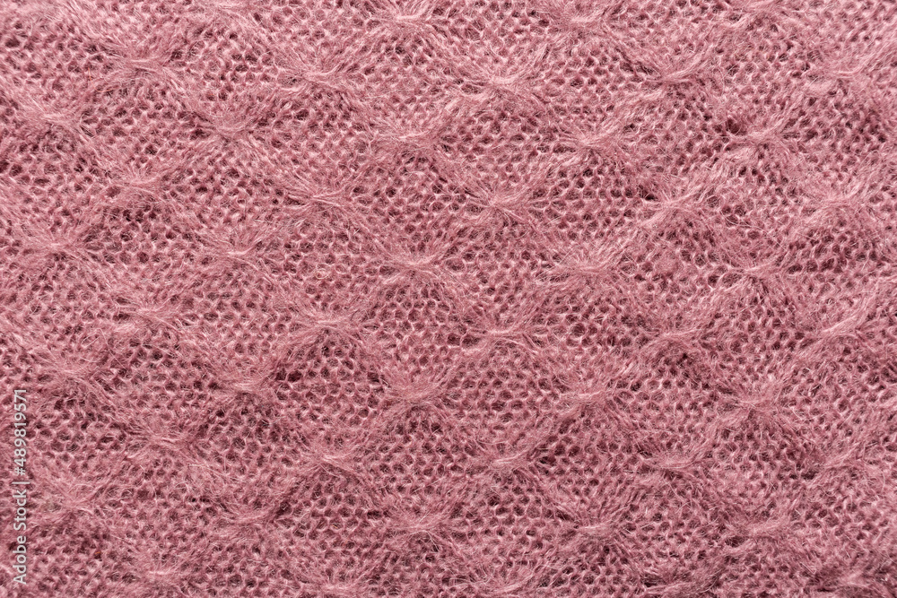 Pink textured fabric. Openwork pattern. Pink textured fabric. Openwork pattern.