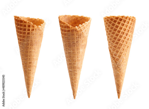 different angle of empty waffle ice cream cone isolated on white background