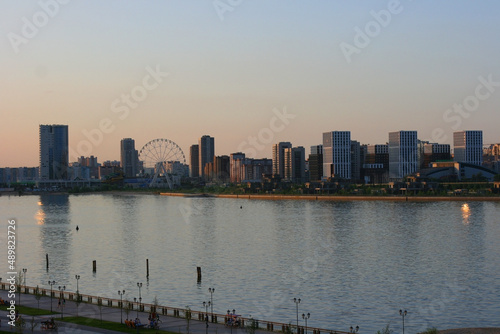 Panoramic views of Kazan from a height in summer. Kazan, Russia - 8 July 2021. View of the city of Kazan on the Bank of the Volga river.