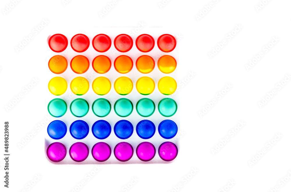 Sensory anti stress toy Pop it Fidget Toy Colorful, on white background. Copy space Sensory anti stress toy Pop it Fidget Toy Colorful, on white background. Copy space