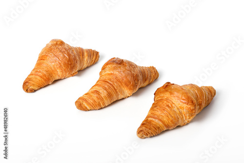 Delicious mini croissants isolated on white background