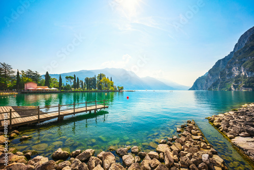 Принти на полотні Wooden pier on the lake. Riva del Garda, Italy