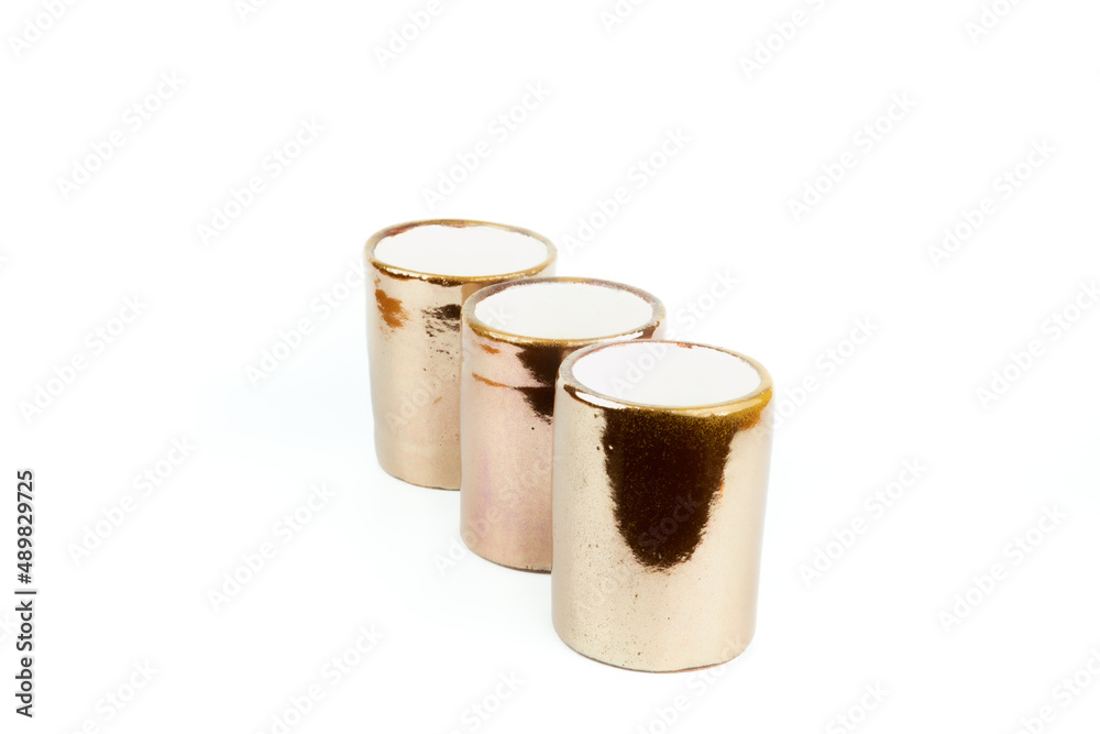 Empty copper colored ceramic shiny vase, isolated on white background, side view. Empty copper colored ceramic shiny vase, isolated on white background, side view.