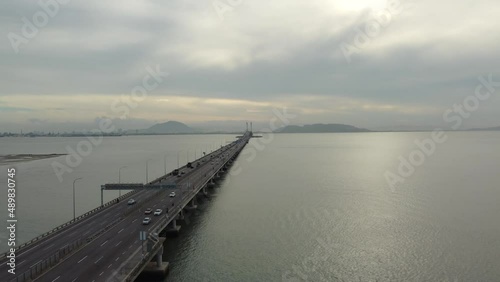 Aerial drone shot of the first Penang Bridge, view facing mainland. The bridge connects Prai on the mainland of Malaysia. photo