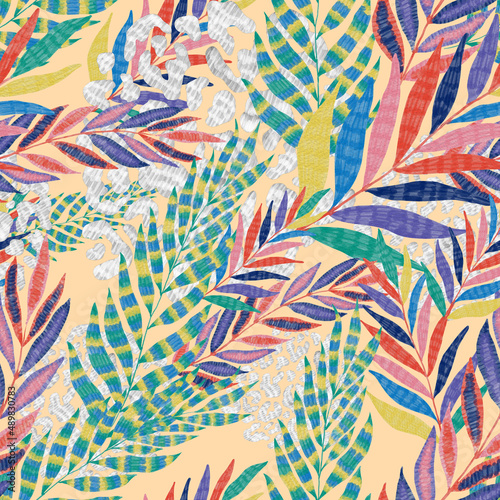 Modern abstract seamless pattern with creative colorful tropical leaves and leopard spots. Retro bright summer background. Jungle foliage illustration. Swimwear botanical design. Vintage exotic print.