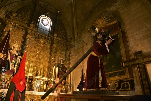 Obraz na plátně Ornately dressed sculpture of Jesús Nazareno carrying the cross, golden baroque