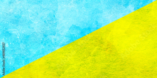 Ukraine Flag painted with grunge texture on concrete wall, Blue yellow wall background. 