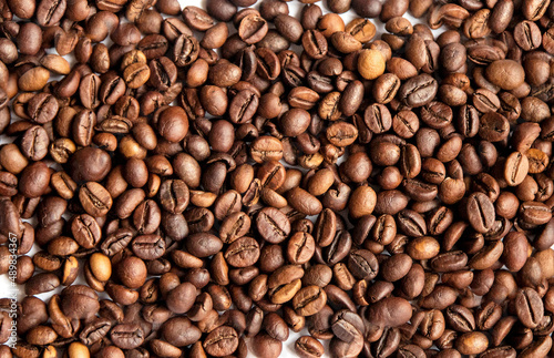 Texture with coffee beans. Coffee pattern. Beautiful background with coffee beans.