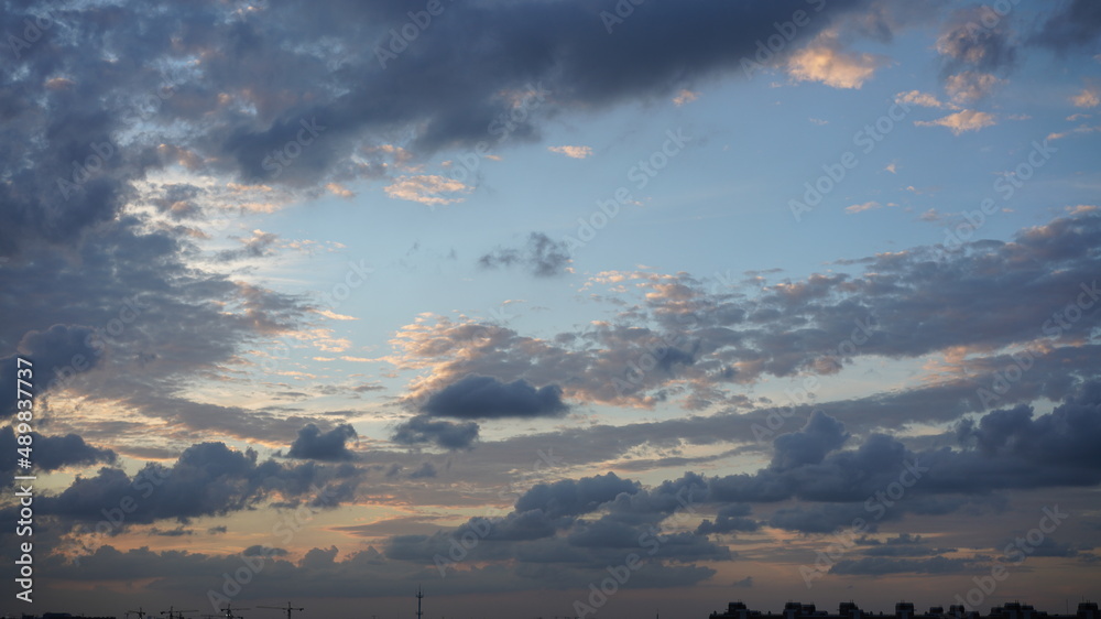 The beautiful sunset view with the colorful clouds and sky in the city The beautiful sunset view with the colorful clouds and sky in the city