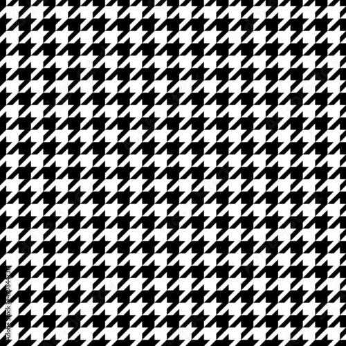 Houndstooth seamless pattern. Repeated houndtooth texture. Black hound tooth on white background. Repeating pepita plaid patern for design prints. Simple abstract plaid dogstooth. Vector illustration