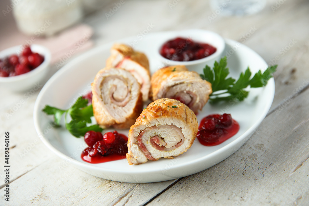 Homemade chicken rolls with cranberry sauce