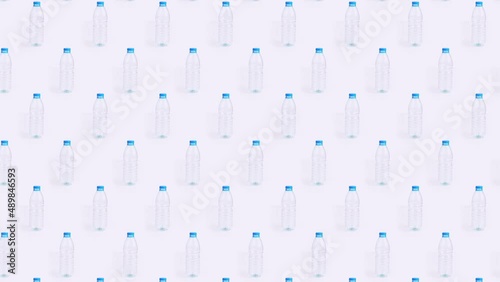 Plastic bottle crushing pattern time lapse on white background Plastic pollution art concept endless loop