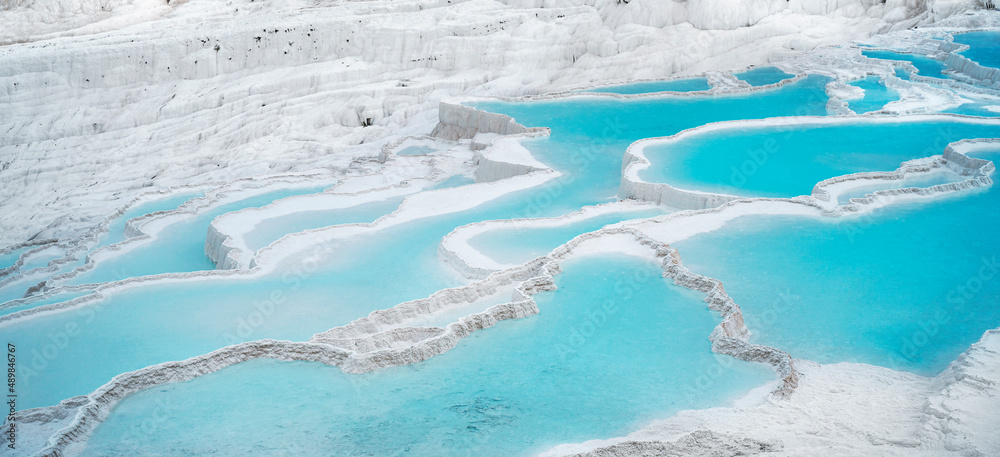 Natural travertine pools and terraces in Pamukkale. Cotton castle in southwestern Turkey. Natural travertine pools and terraces in Pamukkale. Cotton castle in southwestern Turkey.