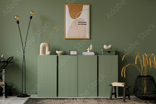 Modern living room interior composition with mockup poster frame, sage  green wooden commode and modern home accessories. Eucalyptus wall. Home  staging. Template. Copy space.. Stock-Foto | Adobe Stock