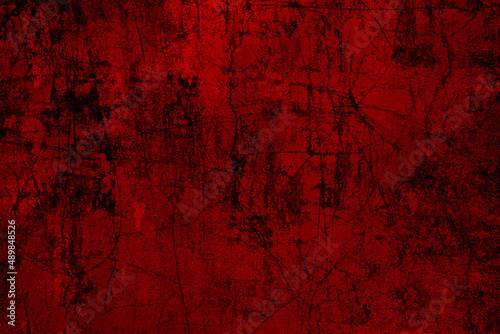 Heavily scratched red color grunge textured rustic metal sheet for background