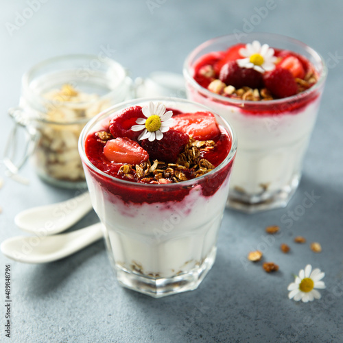 Yogurt dessert with granola and berries