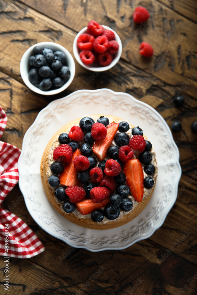 Homemade berry cake with cream filling Homemade berry cake with cream filling