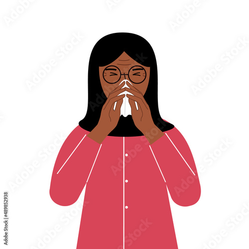 A woman covers his nose with his hands with a handkerchief. The concept of a sick person, sneezing, seasonal allergies, bad smell.
