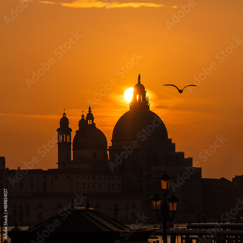 Venice, Italy: November 24 2021. Beautiful golden sunset of the Basilica of Santa Maria della Salud in Venice Italy