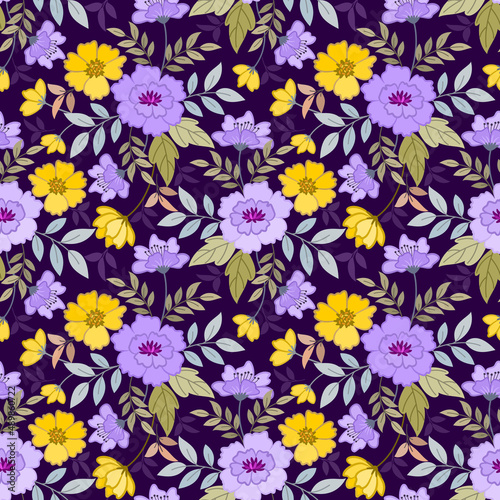Yellow and purple flowers with green leaf on deep purple background seamless pattern.