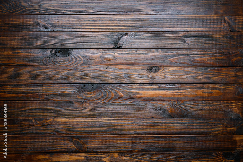 Rustic dark stained wooden table background texture top view Rustic dark stained wooden table background texture top view