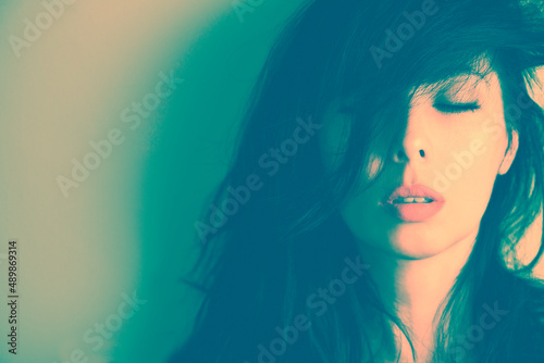 Woman's face with closed eyes. Sad woman's face.
