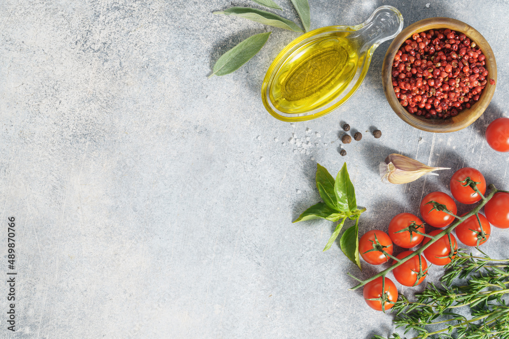 Cooking ingredients background with oil, sage, spice and savory Cooking ingredients background with oil, sage, spice and savory