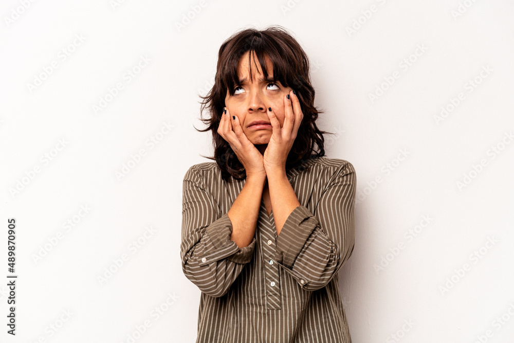 Young hispanic woman isolated on white background whining and crying disconsolately. Young hispanic woman isolated on white background whining and crying disconsolately.