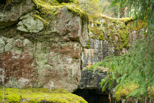 a giant stone structure with an entrance to an underground passage