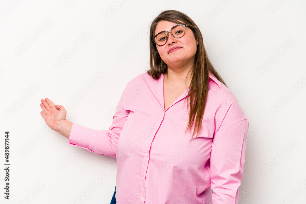 Young caucasian overweight woman isolated on white background showing a welcome expression. Young caucasian overweight woman isolated on white background showing a welcome expression.